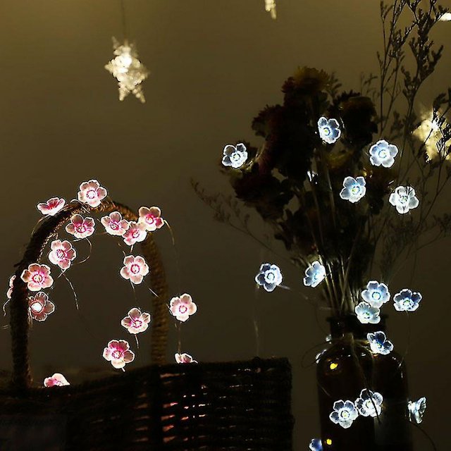 Luces de hadas solares YUANXCMXG 20 luces de Flores LED impermeables para exteriores