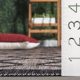 thumbnail image 4 of SAFAVIEH Courtyard Fisher Geometric Quatrefoil Indoor/Outdoor Area Rug, 6'7" x 6'7" Round, Natural/Black, 4 of 12
