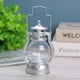thumbnail image 1 of Linterna de aceite LED sin llama antigua Shamjiam de plata, 1 of 7