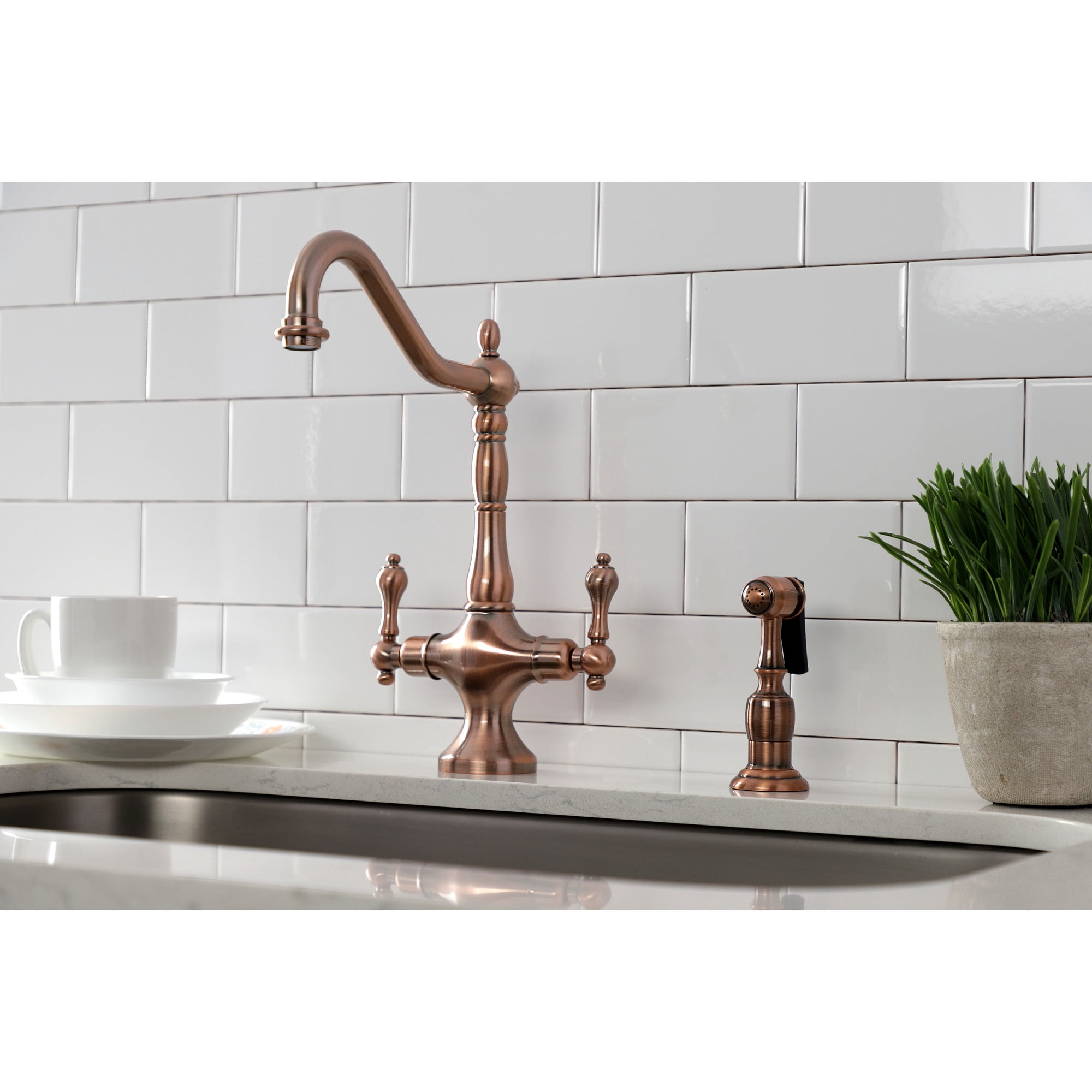 Kingston Brass KS177ALBSAC Heritage Two-Handle 2-Hole Kitchen Faucet with Brass Sprayer in Antique Copper