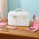 thumbnail image 2 of Bolsa de cosméticos de gran capacidad con estampado floral y doble cremallera. Organizador de maquillaje de viaje para guardar artículos de aseo y papelería, 2 of 4