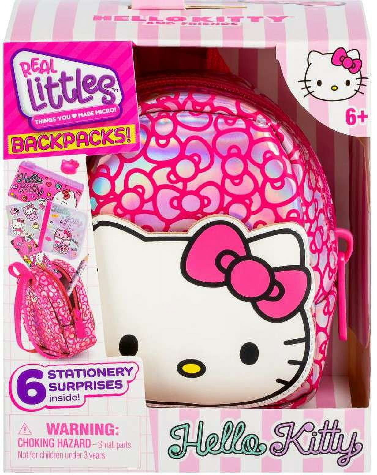 hello kitty backpack toys r us Real Littles Sanrio (Sold Separately)  kiddywampus Take your favorite Sanrio friend on the go with this plush backpack featuring a Hello Kitty in her classic overalls and signature red bow Hello Kitty Trolley Bag L