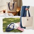 thumbnail image 3 of Bolso de mano de lona para mujer con bordado,bolso de hombro informal,ligero,con múltiples bolsillos,ideal para el día a día,viajes,compras y trabajo., 3 of 6