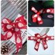 thumbnail image 5 of Cinta de alambre de Papá Noel de 25 yardas y 1 pulgada, roja y dorada, estampada con copos de nieve de poliéster satinado, a granel con carrete, 5 of 5
