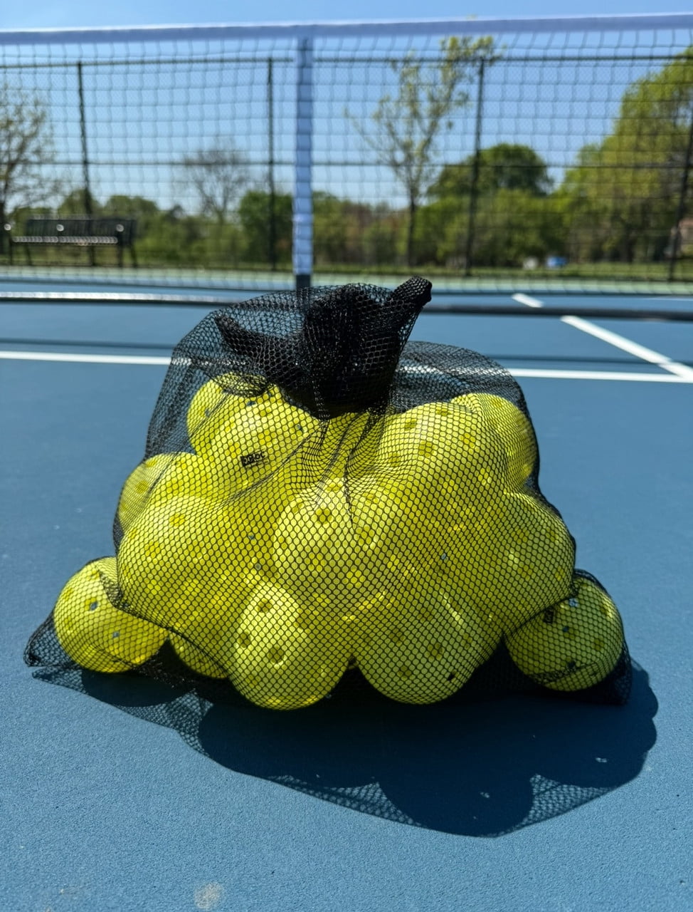 OnCourt OffCourt Pickleballs – 25 Outdoor Balls (Neon Yellow)