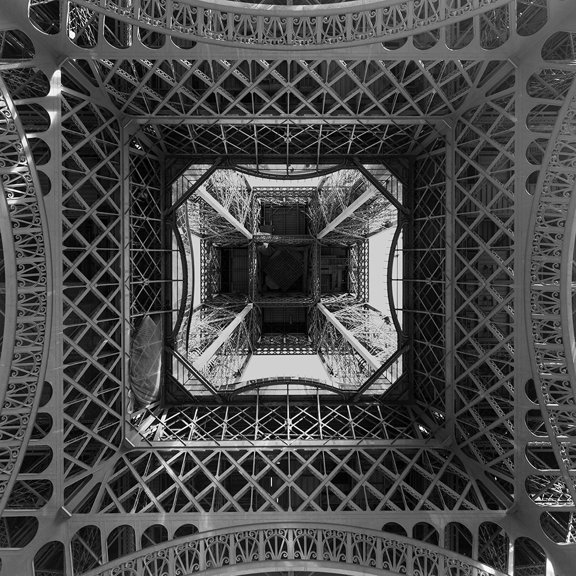 Looking Up inside the Eiffel Tower Poster Print by Stephane Graciet