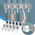 thumbnail image 1 of Gancho para trapeador de baño sin perforaciones, colgador de pared para baño, hebilla fuerte, herramienta de sujeción para trapeador, colgador de trapeador, estante de almacenamiento Akmoler, 1 of 8