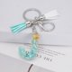thumbnail image 2 of Llavero de letras con borlas verdes | Colgante de cristal acrílico | Lámina de oro, pegamento en gota, joyería de piedra engrosada | Amuleto de bolso con estilo, accesorio para mochila | 1 pieza, 2 of 2