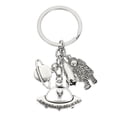 thumbnail image 1 of Llavero colgante de aleación con diseño de astronautas y planetas, llavero decorativo, accesorio para llaves, 1 of 5
