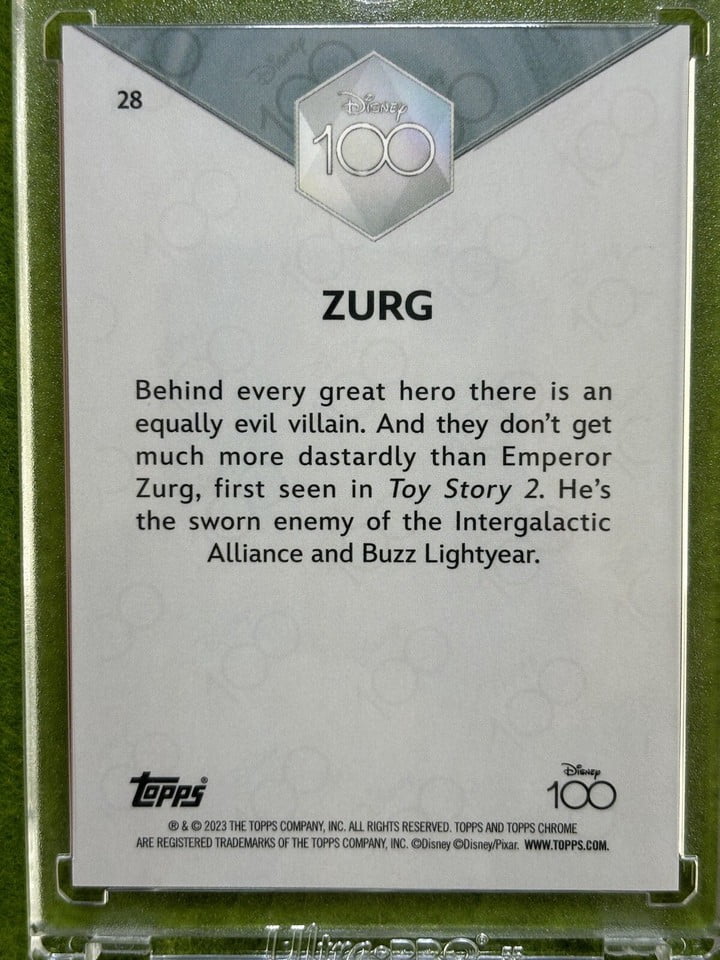 ZURG Disney 100 PINK REFRACTOR #/399 Toy Story 2 CARD 2023 Topps