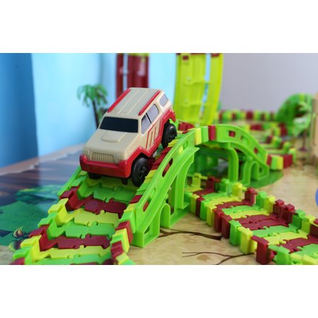 Kid Connection Dinosaur Park Track Set - Dino World, Flexible Race Track, Vehicles & Dinosaurs Included