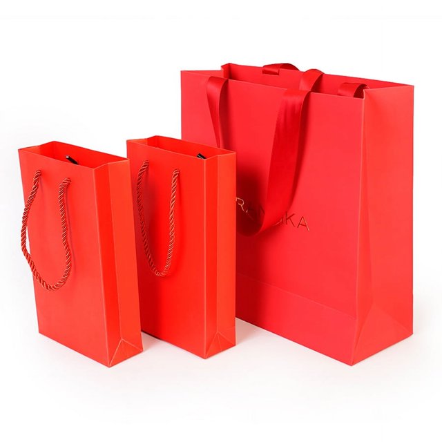 Bolsas de regalo de Navidad de papel Kraft marrón ecológicas impresas personalizadas al por mayor para fiesta decorativa de Navidad