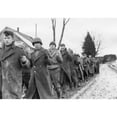 thumbnail image 2 of American Prisoners Of War Are Marched Along A Road During The Battle Of The Bulge. Still From A Captured German Film., 2 of 2