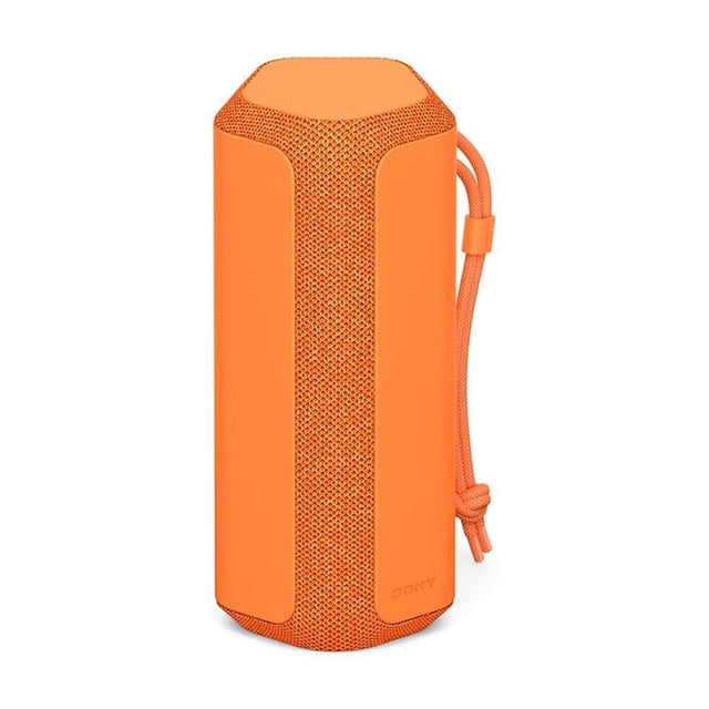 bocina sony inalámbrica portátil srs-xe200 naranja vista frontal centrada de cilindro compacto con malla texturizada naranja y paneles laterales lisos; cordón de transporte lateral, difusor lineal superior y logo Sony en relieve; ideal para exteriores y reuniones, a menudo usada también para llevar música en actividades al aire libre.