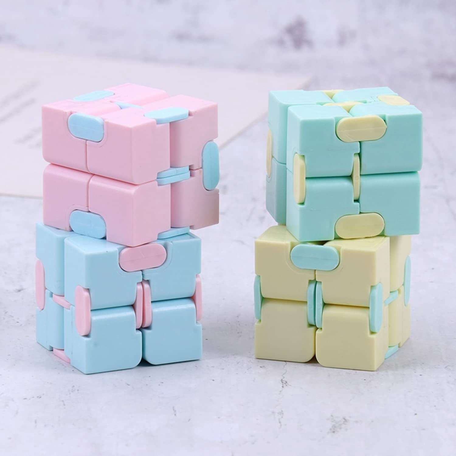Oren Fidget Cube Pack, Infinity Cubes for Sensory Play, Handheld Puzzle Game for Children, Teens - Promotes Fun, Stress Relief & Focus, Blue, Green, Pink, And Yellow - Set of 4