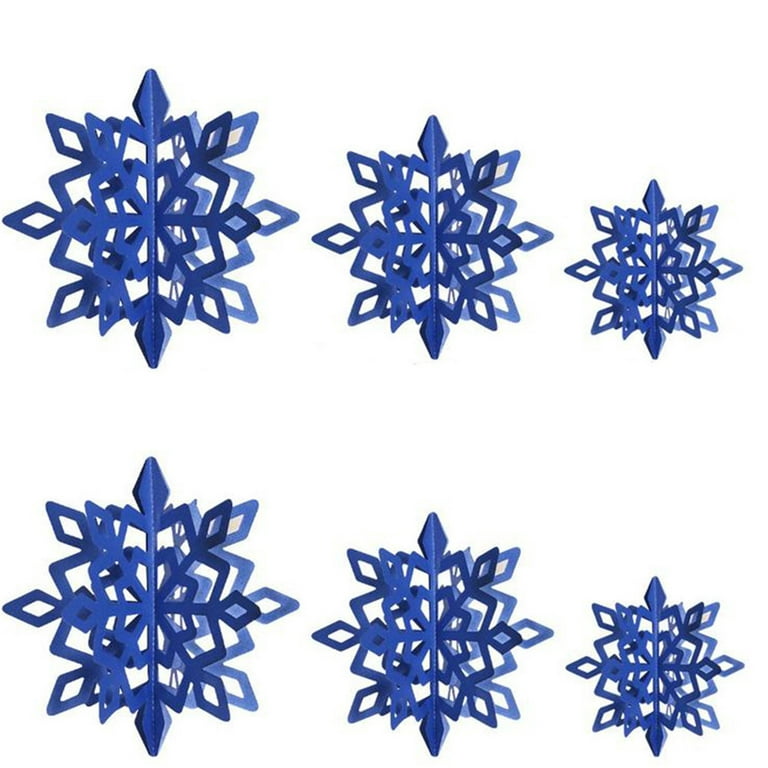 White snowflakes Christmas decorations on blue background. Pattern