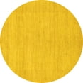 thumbnail image 1 of Ahgly Company Machine Washable Indoor Round Solid Yellow Modern Area Rugs, 3' Round, 1 of 4