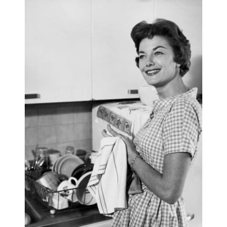 Cloth Board Side profile of a young woman drying her hands with a dish cloth Stretched Canvas - (18 x 24) ()