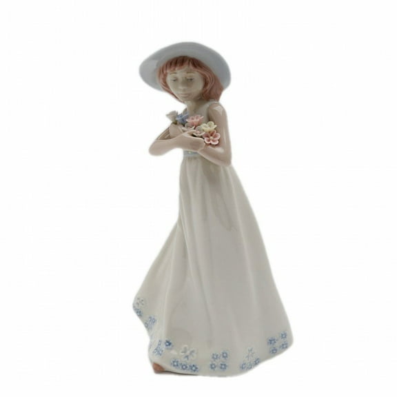 Nadal Girl Holding Flowers