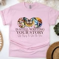 thumbnail image 1 of God Is Still Writing Your Story Christian T-Shirt Faith Graphic Tee, Light Pink, Size 3XL, 1 of 6