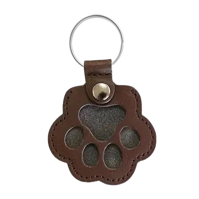 Llavero con forma de huella de perro o gato, un bonito recuerdo para amantes de los perros. marrón oscuro