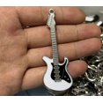 thumbnail image 1 of Llavero con colgante de bolso con forma de estrella de cinco puntas y diseño de guitarra Y2K estilo hip hop, 1 of 6