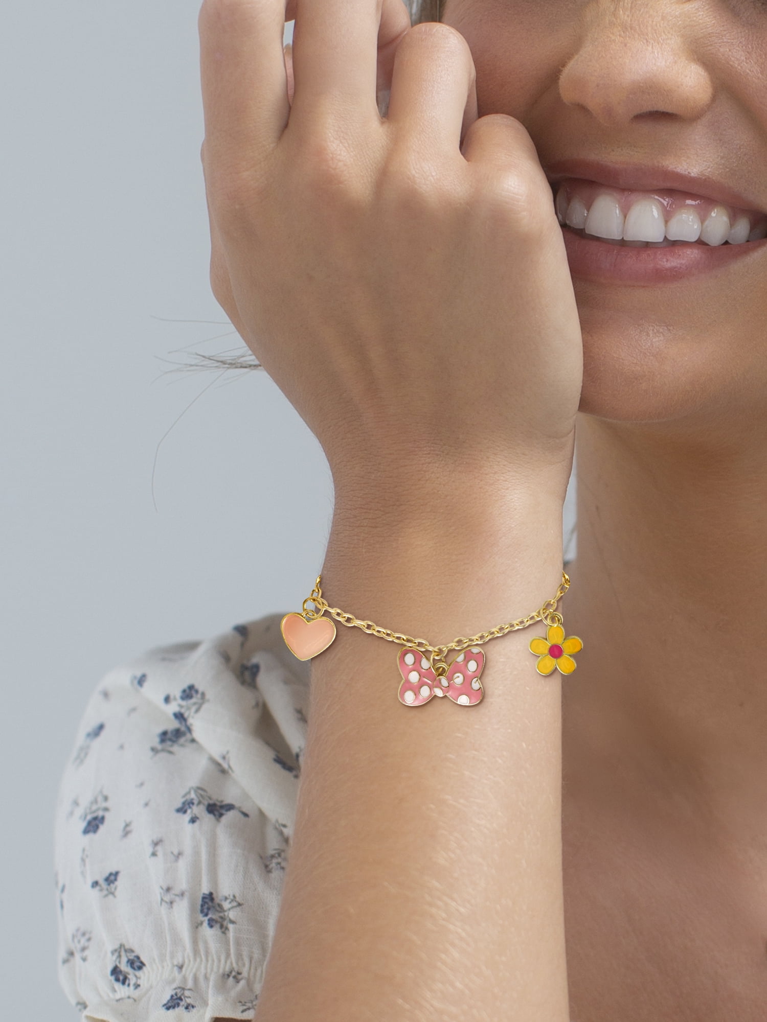 Disney Women's Minnie Mouse Bow Charm Bracelet with Polished Finish