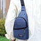 thumbnail image 4 of Fiudx Mochila Cruzada, Diseño Multicompartimento, Correa de Hombro Ajustable, Material Oxford Ligero, Bolsillo para Auriculares, Ideal para Viajes o Trabajo, Unisex, Tamaño 30 X 17 X 5 Cm, 4 of 7