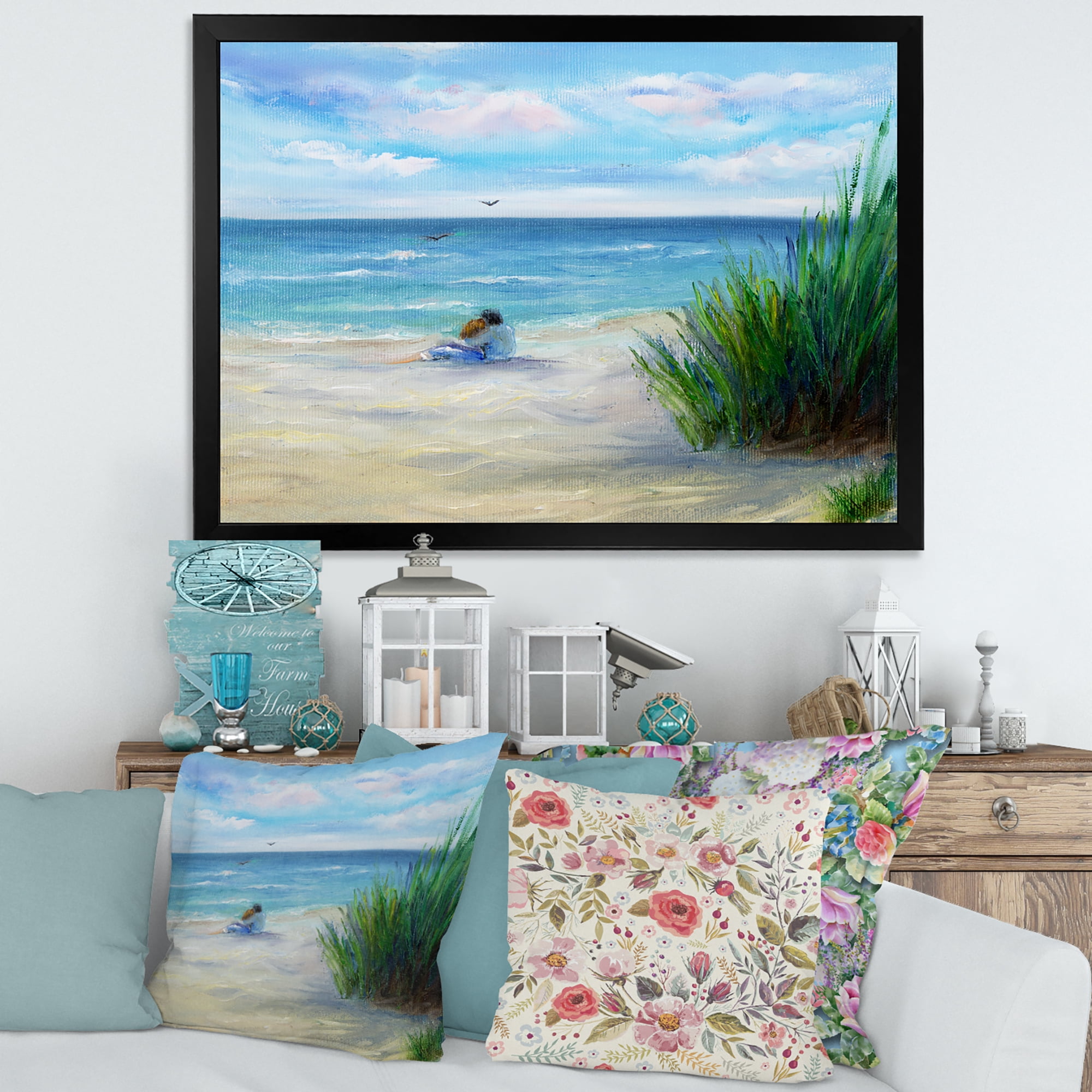 Designart 'Couple Sitting In Love By The Beach' Nautical & Coastal Framed Art Print