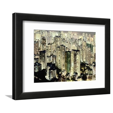 Hong Kong skyscrapers and apartment blocks at night Framed Print Wall Art By Martin Puddy