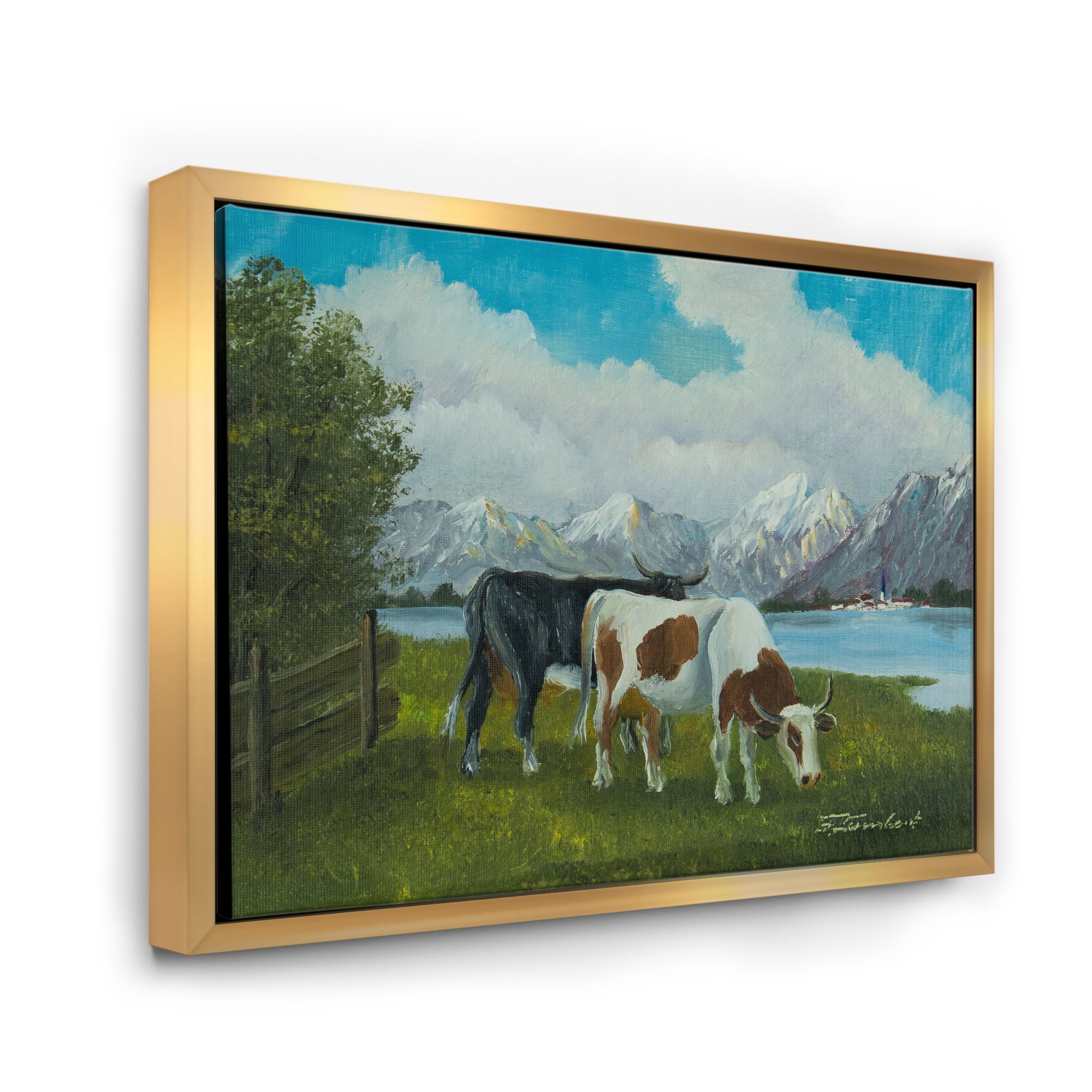 Cows Eating Grass In Front Of A Lake 32 in x 24 in Framed Painting Canvas Art Print, by Designart