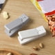 thumbnail image 1 of Mini Sellador de Bolsas Portátil, Tecnología de Calor Instantáneo, Carga Usb, Sellado Hermético para Bolsas de Refrigerador, Ahorrador de Alimentos Frescos, Ideal para Cocina, Camping y Viajes, Tamañ, 1 of 5