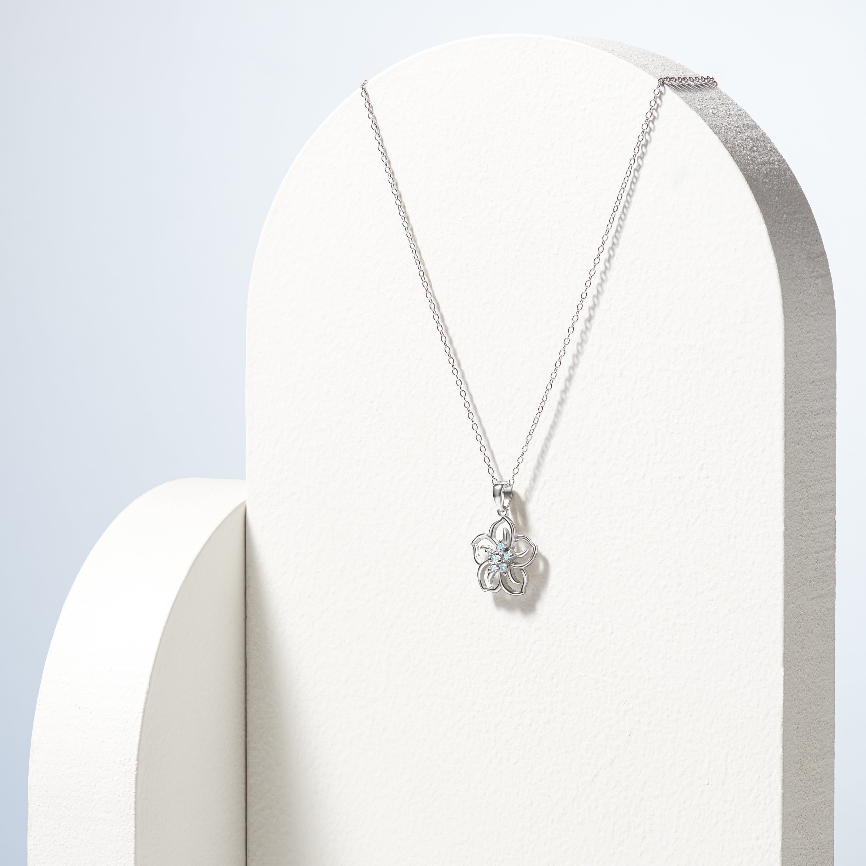 Forever Facets Genuine Blue Topaz December Birthstone Floral Pendant in Sterling Silver, Adult Female
