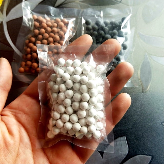Bola de turmalina Purificación de agua Material del filtro Tratamiento de agua Bola de energía Embalaje de gramo Eliminación de cloro Ducha Bolas de iones negativos