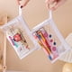 thumbnail image 5 of Estuche transparente impermeable para lápices, organizador de cosméticos con cremallera, bolsa de viaje de PVC triangular transparente | Pinceles de maquillaje | Papelería | Pequeñas, 5 of 6