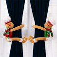 thumbnail image 1 of hebillas para cortinas con forma de hombre de jengibre. Adecuadas para cortinas de cualquier tamaño, mejoran el ambiente navideño y la decoración del hogar., 1 of 7