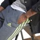 thumbnail image 2 of Pantalones adidas Essentials de forro polar con puños cónicos, 3 rayas, para hombre, 2 of 9