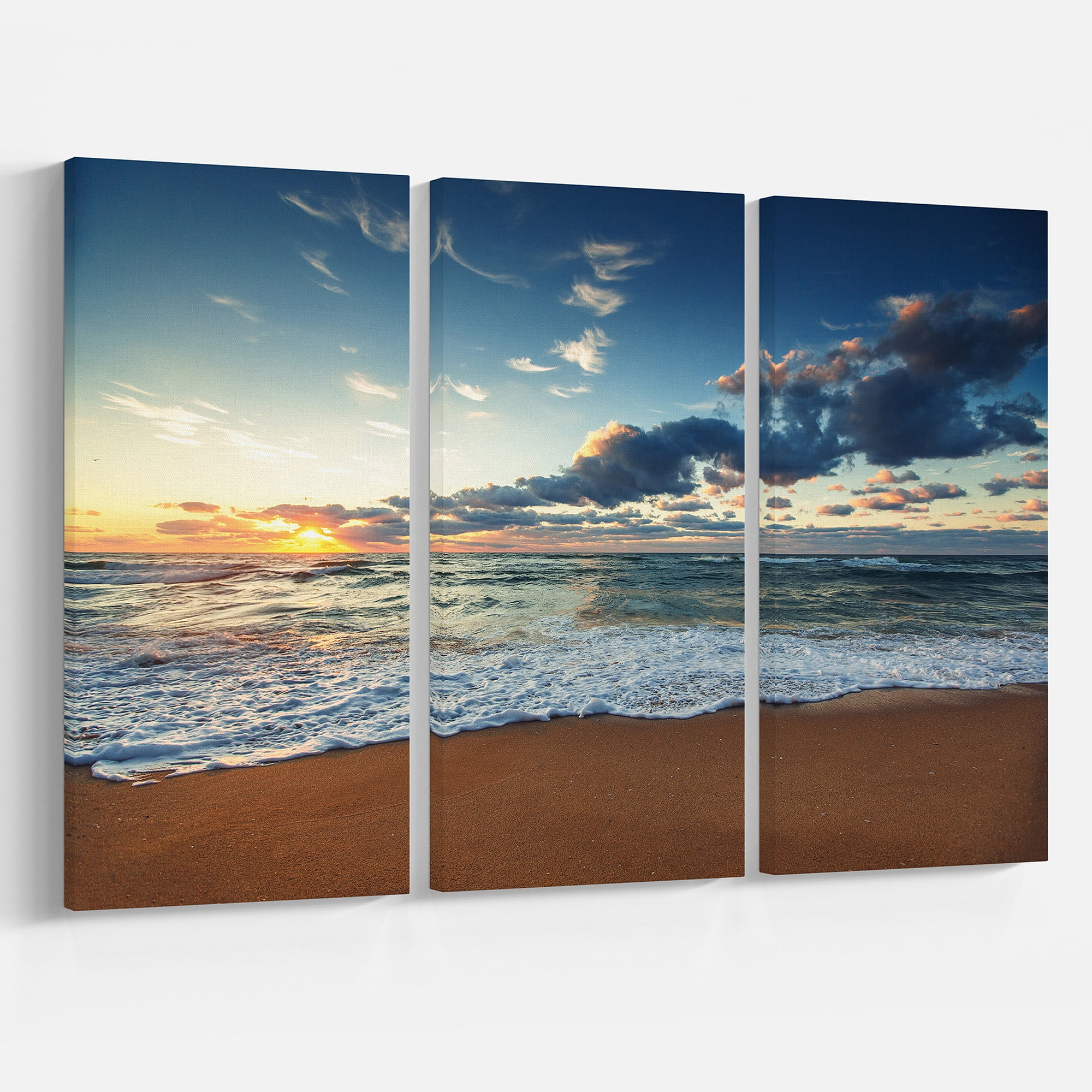 Designart 'Sunrise and Glowing Waves in Ocean ' Seascape Canvas Art Print