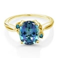 thumbnail image 2 of Gem Stone King 18K Yellow Gold Plated Silver Millennium Blue Mystic Topaz and Blue Diamond 3 Stone Ring for Women (3.03 Cttw, Oval 10X8MM, Gemstone Birthstone, Size 8), 2 of 4