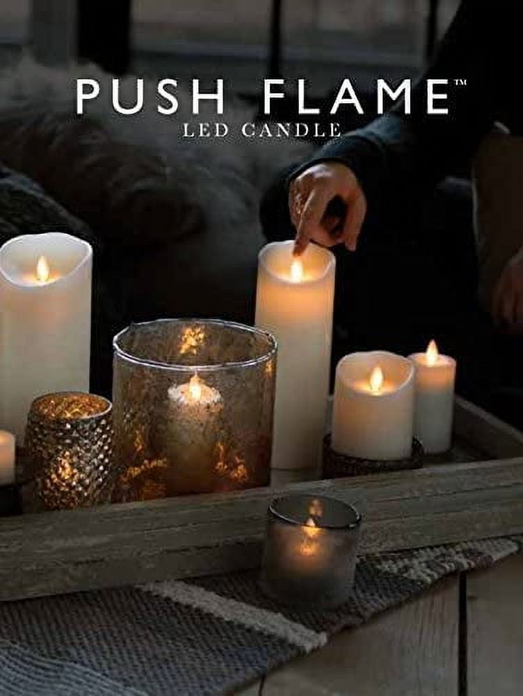 Liown 37070 - 9" Ivory Wax Push Flame LED Pillar Candle with Timer