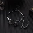 thumbnail image 2 of Faty-T Black Skeleton Hand 2‑Piece Jewelry Set, Articulated Bone Choker Necklace & Matching Skeleton Hand Dangle Earring Kit for Women, Spooky Punk Gothic Statement Costume Jewelry for Halloween, 2 of 4