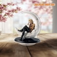 thumbnail image 7 of Revolving acrylic ornament featuring Rod Stewart on a half-moon beside a gift box, mounted on a glossy black oval base with a white background, 7 of 7