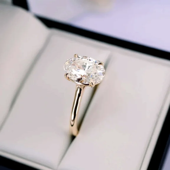 Oval Cut Simulated Diamond Solitaire Engagement Ring in 14K Yellow Gold Plated
