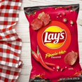 thumbnail image 3 of Lay's Potato Chips, Flamin' Hot Flavored Snacks, 7.75oz Bag, 3 of 5