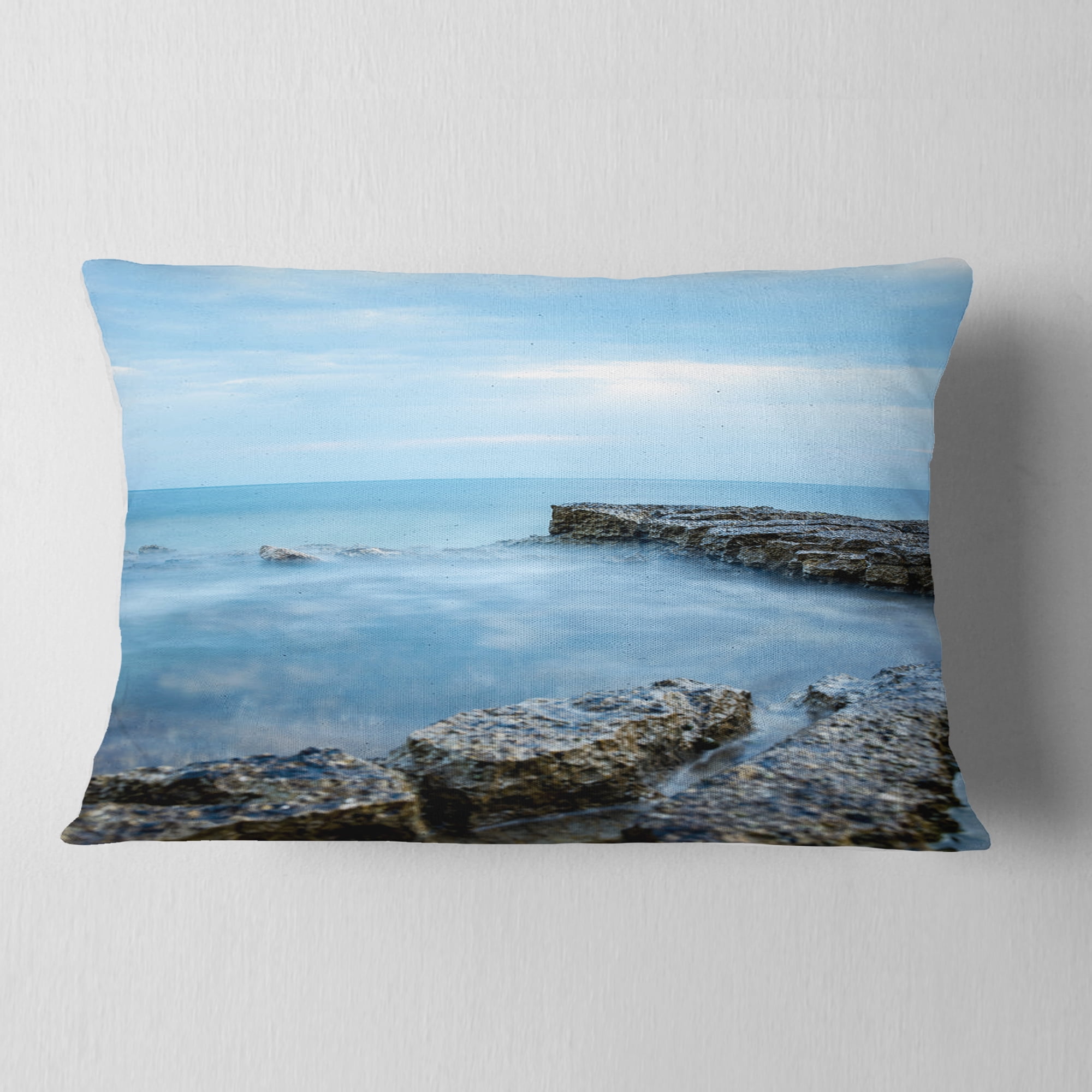 Designart Blue Rocky Seashore - Beach Photography Throw Pillow - 12x20