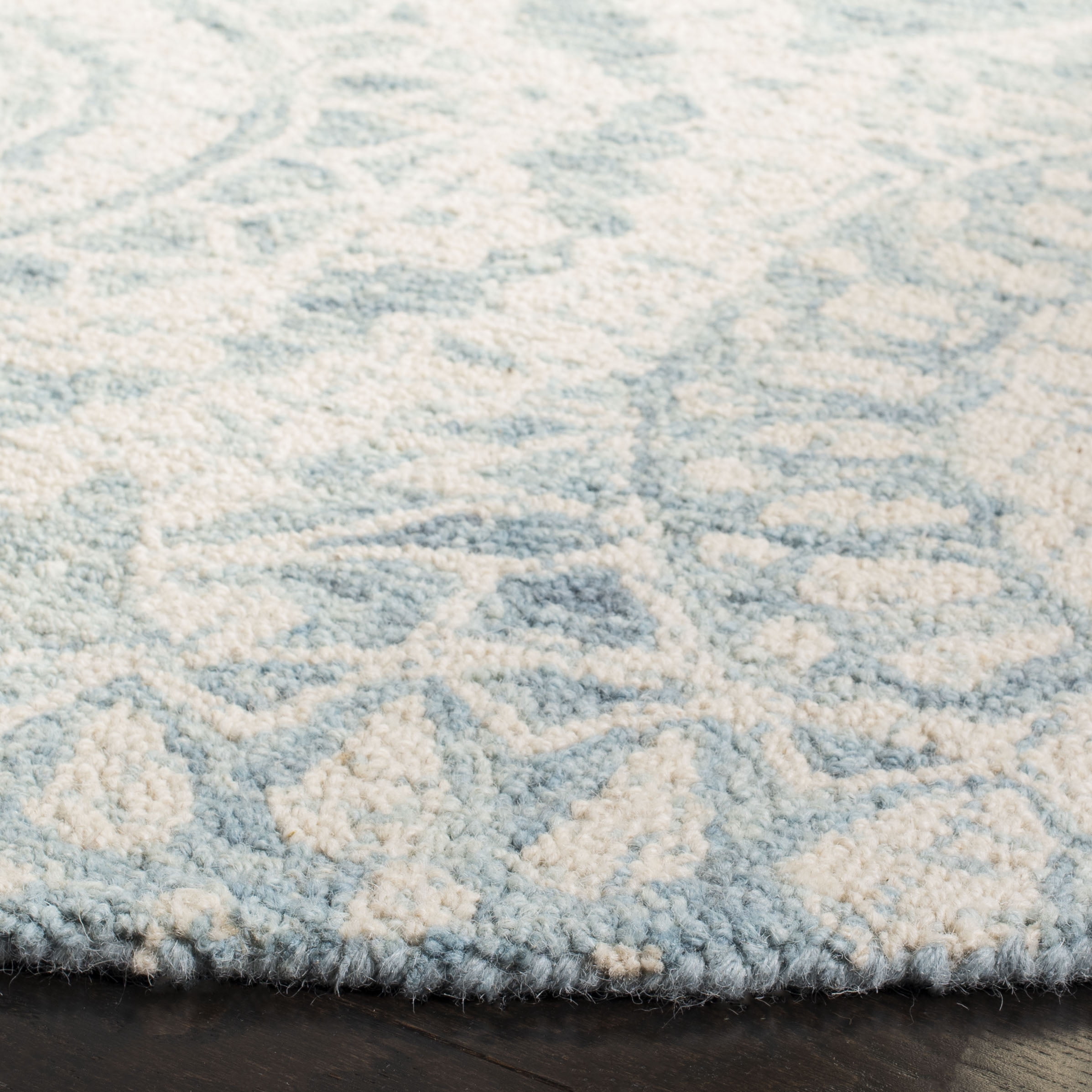 SAFAVIEH Abstract Tobon Geometric Circles Area Rug, Ivory/Blue, 6' x 6' Round