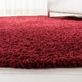 thumbnail image 3 of SAFAVIEH August Carlene Solid Plush Shag Area Rug, Burgundy, 6'7" x 6'7" Round, 3 of 7