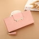thumbnail image 4 of Tendencia de la moda Borla dama sosteniendo bolso, 4 of 5