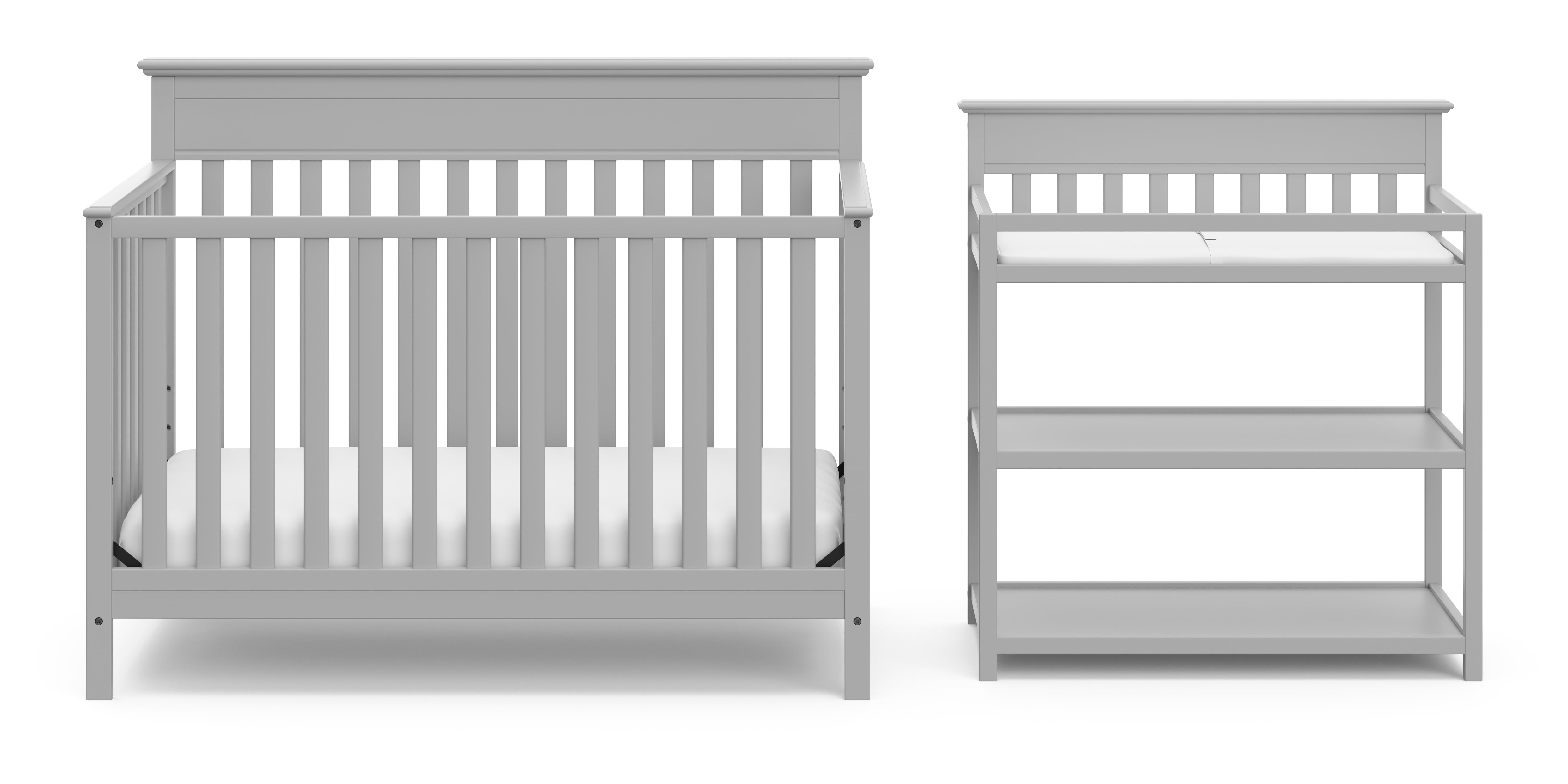 white crib and changing table set