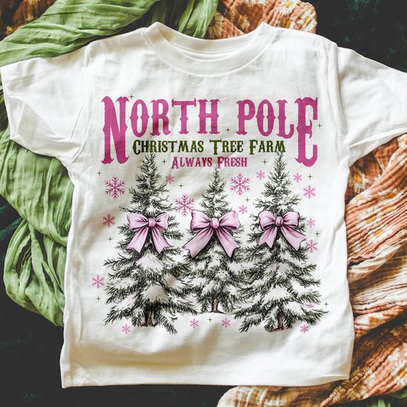 North Pole Christmas T-Shirt – Coquette Pink Bow Tee with Holiday Tree and Retro Seasonal Cheer